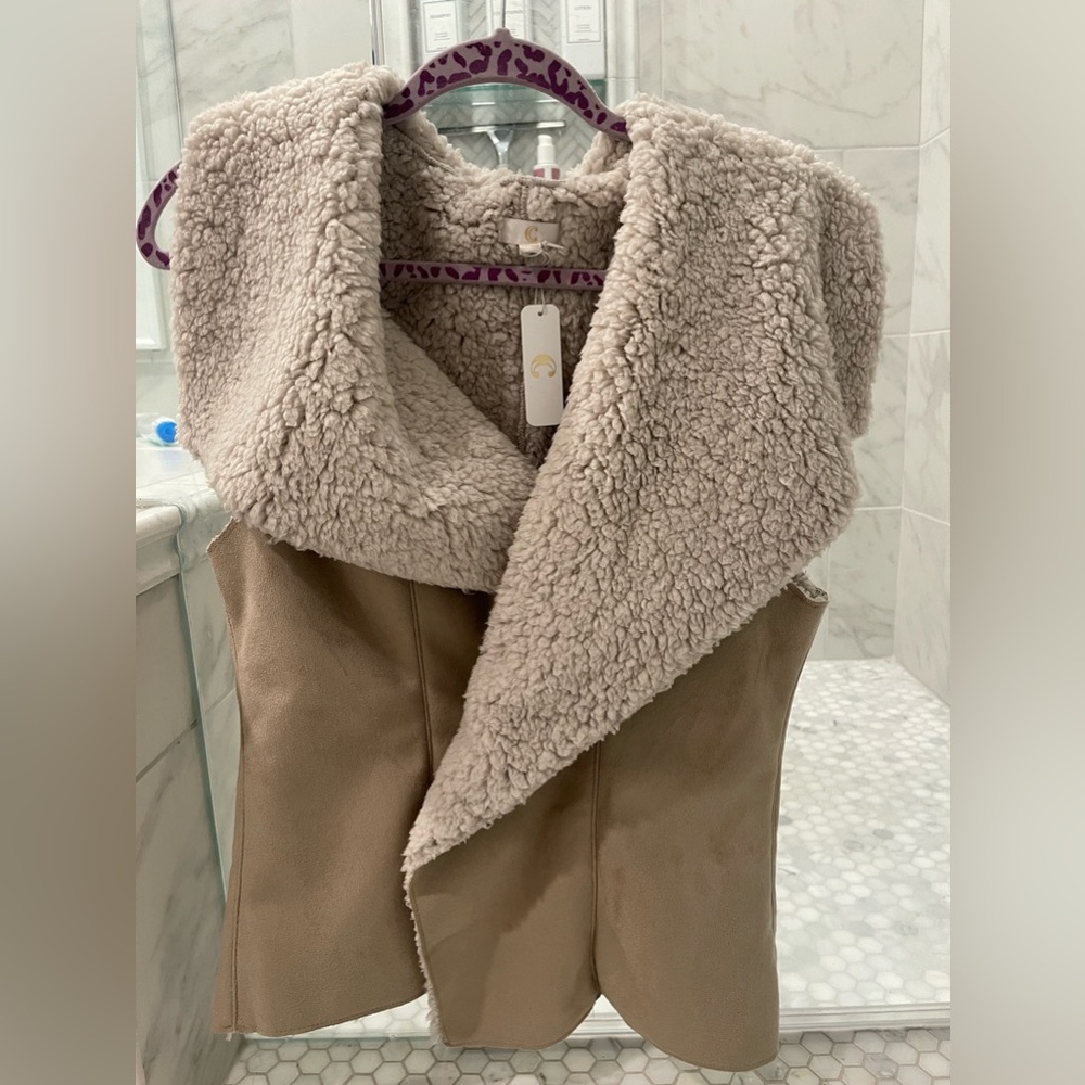 Shearling and Suede vest. Large never worn.